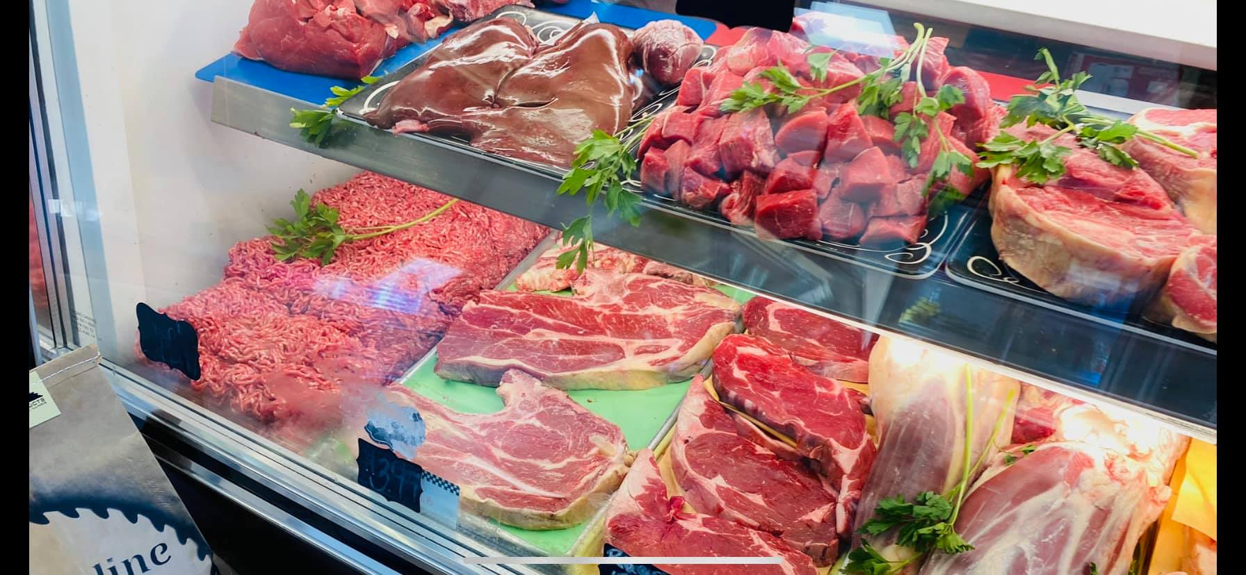 Fresh halal beef cuts displayed in the butcher case at USA Halal Meat