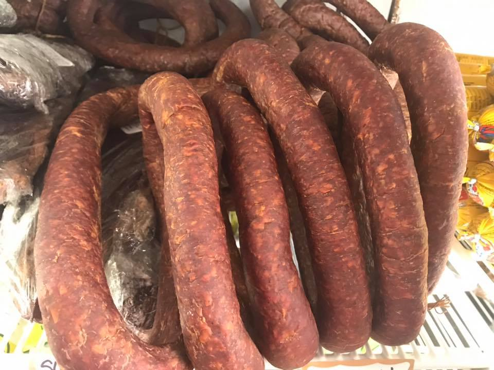 Stack of house-smoked Bosnian cured beef and sudžuk sausages